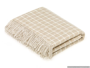 Brontemoon Classic Collection Merino Lambswool blanket and pillows featuring soft, cozy wool texture in neutral tones.