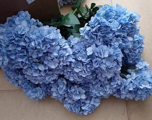Artificial silk hydrangea flower with soft, full blooms in shades of pink and purple, perfect for home decor by Sweet Home Deco.