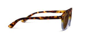 Peepers Neptune sunglasses with clear reading glasses lenses and stylish black frames, perfect for reading outdoors.