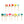 Rainbow Happy Birthday candles from Talking Tables USA, colorful wax candles arranged for birthday celebration decor.