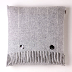 Soft Merino Lambswool throw and pillow set from Bronte Moon's Classic Collection, featuring cozy, textured fabric in neutral tones.