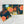 Set of four Dot and Army winter floral cloth dinner and cocktail napkins with festive floral patterns.