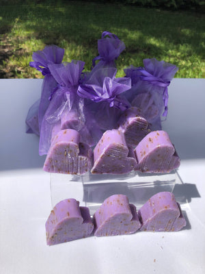 Tiny heart-shaped soaps by La Belle France wrapped in organza gift bag, perfect for gifting or decorative display.