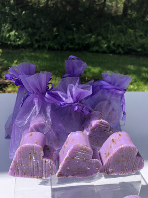Tiny heart-shaped soaps from La Belle France wrapped in organza gift bag, perfect for gifting or decoration.
