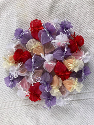 Set of La Belle France tiny heart-shaped soaps wrapped in organza gift bag, perfect for gifting or decorative display.