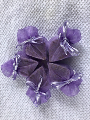 Tiny heart-shaped soaps from La Belle France wrapped in organza gift bag, perfect for gifting or decorative display.