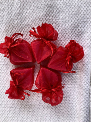 Set of La Belle France tiny heart-shaped soaps wrapped in organza gift bag for decorative and gift purposes
