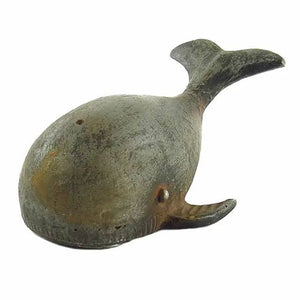 Pewter whale-shaped bottle opener from Vagabond Vintage, featuring detailed whale design on a sturdy metal opener.