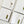 Set of four white Martini Olive Cloth Cocktail Napkins by Dot and Army, soft fabric with olive pattern for elegant table settings.