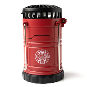 Rechargeable DM Merchandising LIGHT-LANTERN AND FAN-2-In-1 with built-in handle, compact design, and dual lighting and cooling functions.