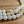 White onyx triple necklace by Nellie Pratt Artisan Jewelry featuring layered white onyx beads and sterling silver accents.