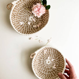 Set of Naomi nesting bowls from Flax & Twine, displayed stacked with natural ceramic finish in a modern kitchen setting.