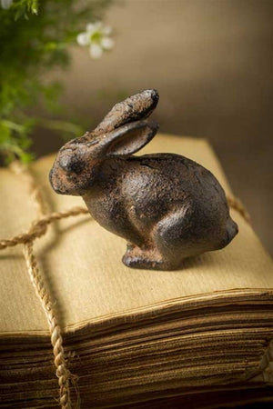 Small cast iron rabbit figurine by Vagabond Vintage, featuring detailed texture and a charming vintage-style design.