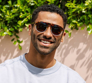 Peepers Neptune sunglasses with clear reading lenses, stylish frame, and UV protection, designed for fashionable eye comfort.