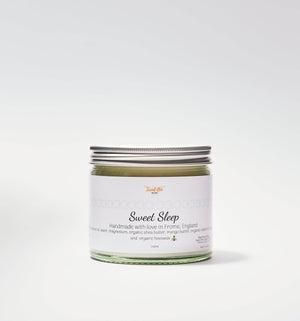 Sweet Bee Organics Sweet Sleep Magnesium Butter jar labeled for sleep aid, with natural ingredients and organic branding.