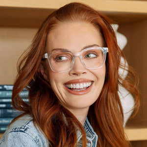 Peepers To the Max reading glasses with clear frames and metal temples, close-up shot showing stylish eyewear.