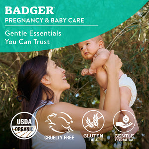 Badger Baby Balm for soothing diaper rash, cradle cap, and dry skin on a baby’s skin in a natural setting