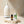 Cliganic ceramic aromatherapy essential oil diffuser in white, with a sleek design and a small opening for mist and aroma release.