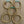 Turquoise glass and brass bracelet set featuring handmade Nellie Pratt Artisan Jewelry with vibrant beads and intricate metalwork.