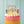 Set of 24 striped multicolor birthday cake candles from Talking Tables USA, perfect for celebrating with festive decor.