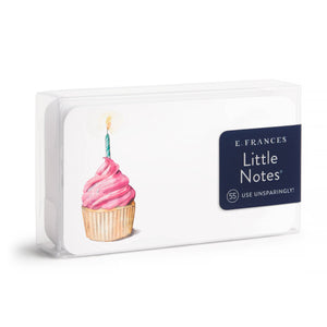 Cupcake with pink frosting and lit candle on note card pack labeled "Little Notes."