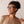 Peepers reading glasses with transparent frames and clear lenses, stylishly displayed on a white background.
