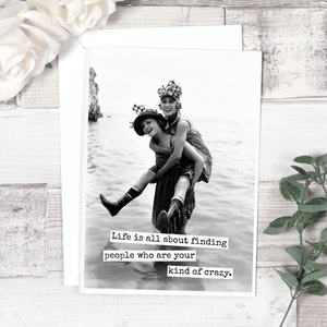 Raven's Rest Studio friendship greeting card with heartfelt message about finding people, featuring colorful floral design.