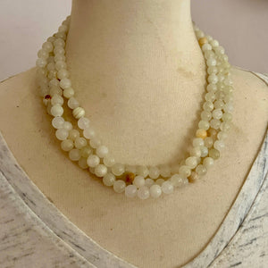 White onyx triple necklace by Nellie Pratt Artisan Jewelry featuring layered silver chains and elegant gemstone accents.