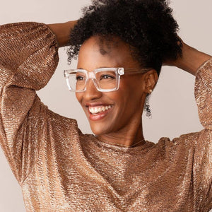 Peepers Spotlight reading glasses with clear frames and stylish design, shown on a white background.