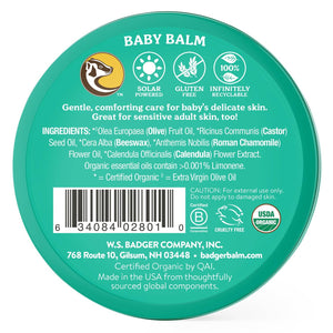 Badger Baby Balm for soothing diaper rash, cradle cap, and dry skin on a baby's skin in a natural setting