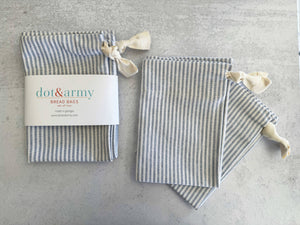 Set of two Dusty Blue Stripe Linen Bread Bags by Dot and Army, featuring a classic striped design for fresh bread storage.