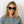 Peepers Venue sunglasses with clear reading glasses lenses, stylish black frame and sleek design for everyday wear.