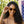 Peepers Capri sunglasses with clear reading glasses lenses, stylish eyewear with black frames and rounded design.