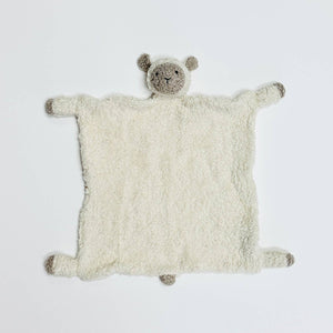 White plush lamb blanket with gray ears and paws on a plain white background.