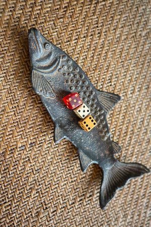 Decorative cast iron fish dish by Vagabond Vintage, featuring intricate fish design perfect for rustic or vintage home decor.