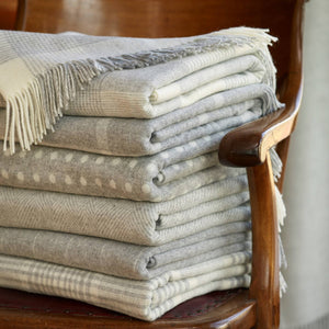 Bronté Moon Classic Collection Merino Lambswool throw blanket and pillow set in soft, cozy wool fabric.