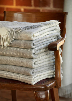 Bronté Moon Classic Collection Merino Lambswool throw blanket and pillow set in soft, cozy wool fabric.