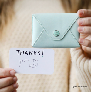 Set of E. Frances Paper thank you note cards featuring "Thanks" design, perfect for expressing gratitude in handwritten messages.