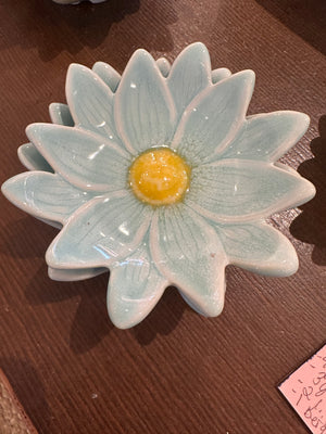 Small flower-shaped dinner plate by CCOI with reactive glaze finish, showcasing vibrant floral patterns and a glossy surface.