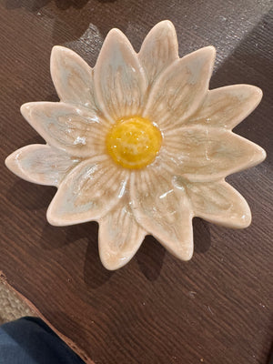 Small flower-shaped dinner plate by CCOI with reactive glaze finish, showcasing vibrant colors and intricate design.