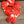 Glass pocket hearts in three color schemes, decorative home accents by SHOPGIVECOURAGE, shown in a close-up image.