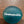 Imprinted glass word stones from SHOPGIVECOURAGE displayed in a bowl, featuring inspirational words on smooth, polished stones.