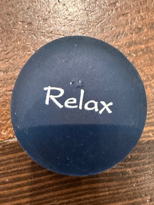 Sea stones with imprinted glass words displayed in a bowl, featuring 60 decorative SHOPGIVECOURAGE word stones for home or office decor.
