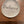 Imprinted glass word stones from SHOPGIVECOURAGE displayed in a bowl, featuring inspiring messages on clear, polished stones.