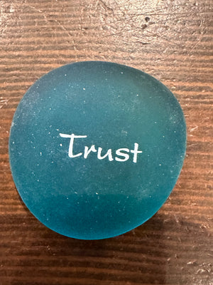 Imprinted glass word stones in a bowl display, featuring 60 Sea Stones by SHOPGIVECOURAGE with engraved inspirational messages.
