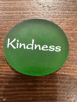Imprinted glass word stones from SHOPGIVECOURAGE displayed in a bowl, featuring inspirational messages on 60 decorative stones.