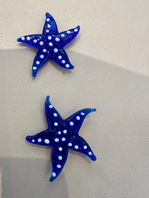 Miniature glass starfish figurine, collectible decorative ornament from SHOPGIVECOURAGE with intricate glass craftsmanship.
