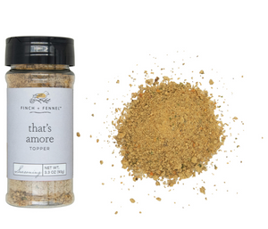 FF That's Amore 3.3 oz. seasoning topper blend in a clear jar, featuring a colorful mix of herbs and spices for flavorful dishes.