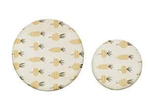 Reusable CCOI beeswax food covers with fun printed designs for food storage, eco-friendly and breathable kitchen accessories.