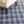 An AnS denim plaid handwoven cotton rug in 2x3 feet with a casual, woven design featuring blue and white denim-inspired patterns.